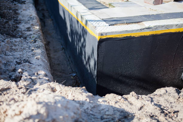 Professional Exterior Waterproofing technician working in Shawnee, KS